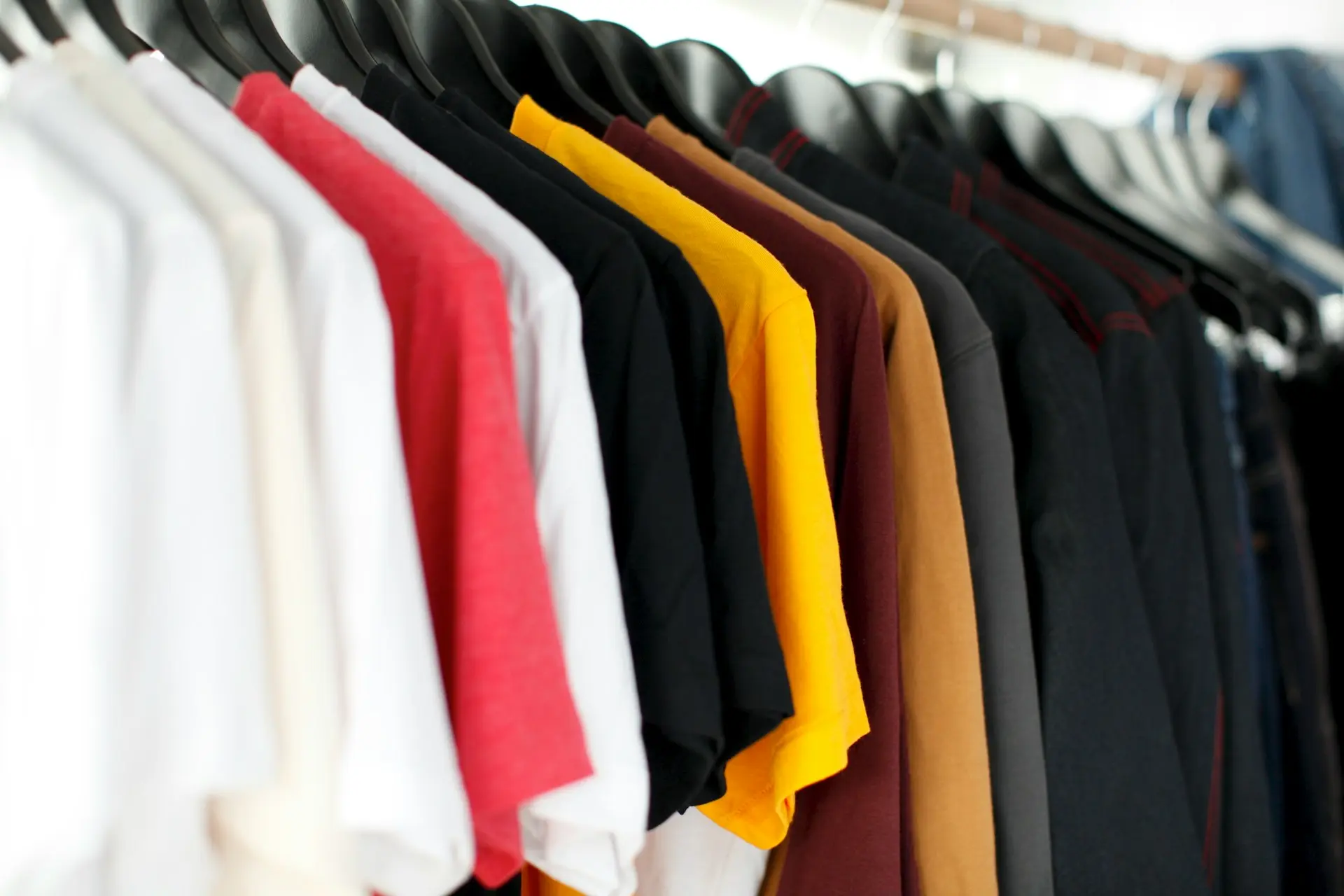 Tshirts closeup of hanged shirts on rack